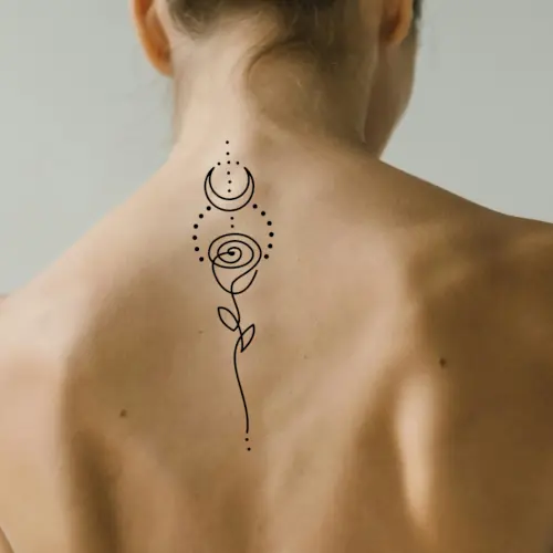 Real life look of elegant line art spine tattoo