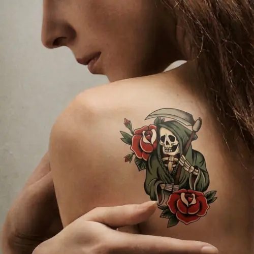 Real life look of traditional bold line grim reaper tattoo